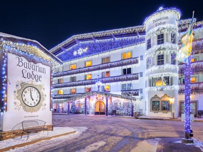 View of outside of hotel with christmas lights at night
